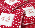 Potholder, patchwork with embroidery - Red